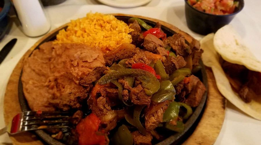 Joe T. Garcia’s Mexican Dishes signature dishes The Family Style Dinner (Cheese Enchiladas, Beef Tacos, Nachos, Guacamole, Rice, Beans), Fajitas, Margaritas.
﻿﻿﻿﻿﻿